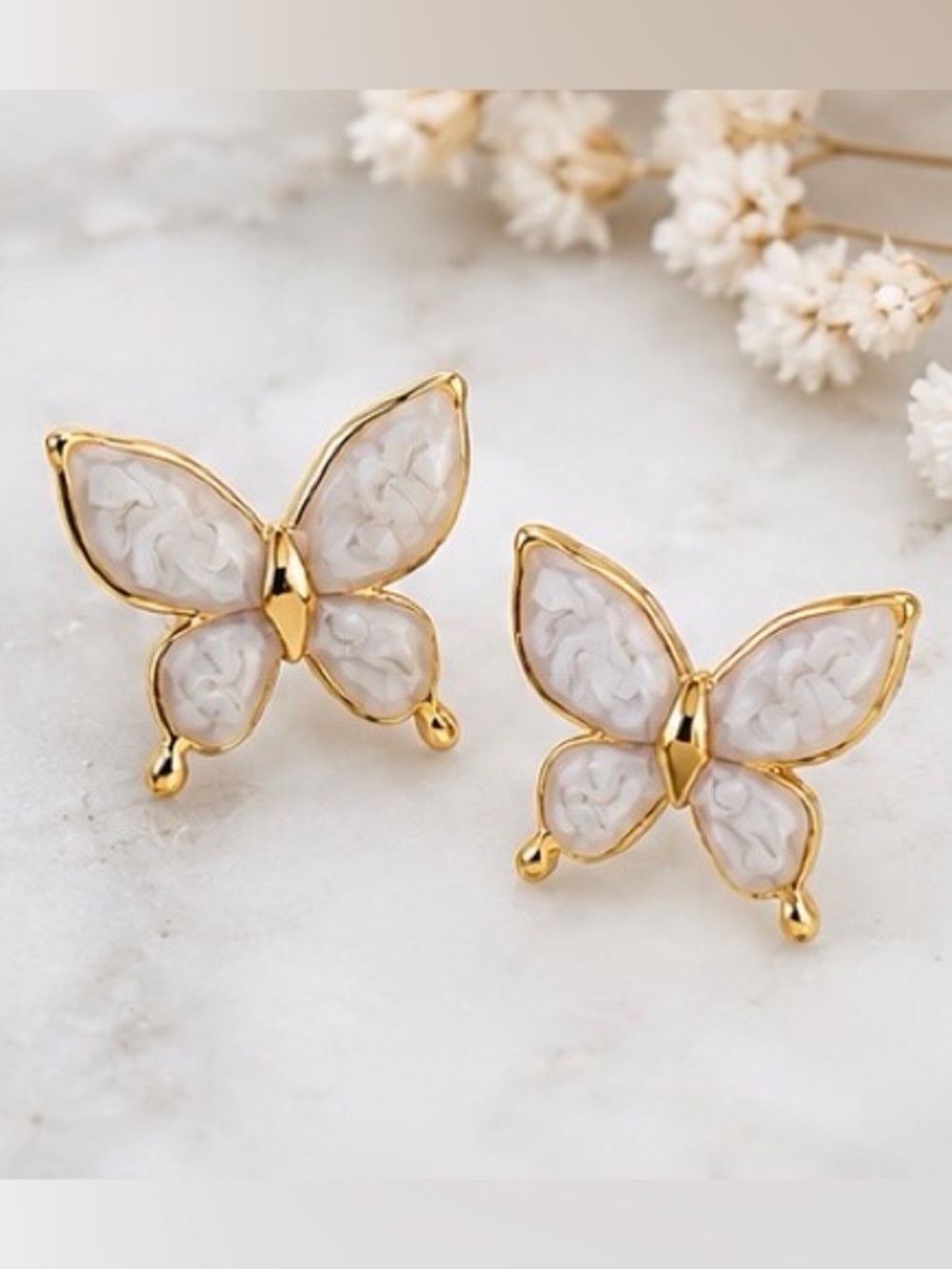 Gold Butterfly Stud Earrings.